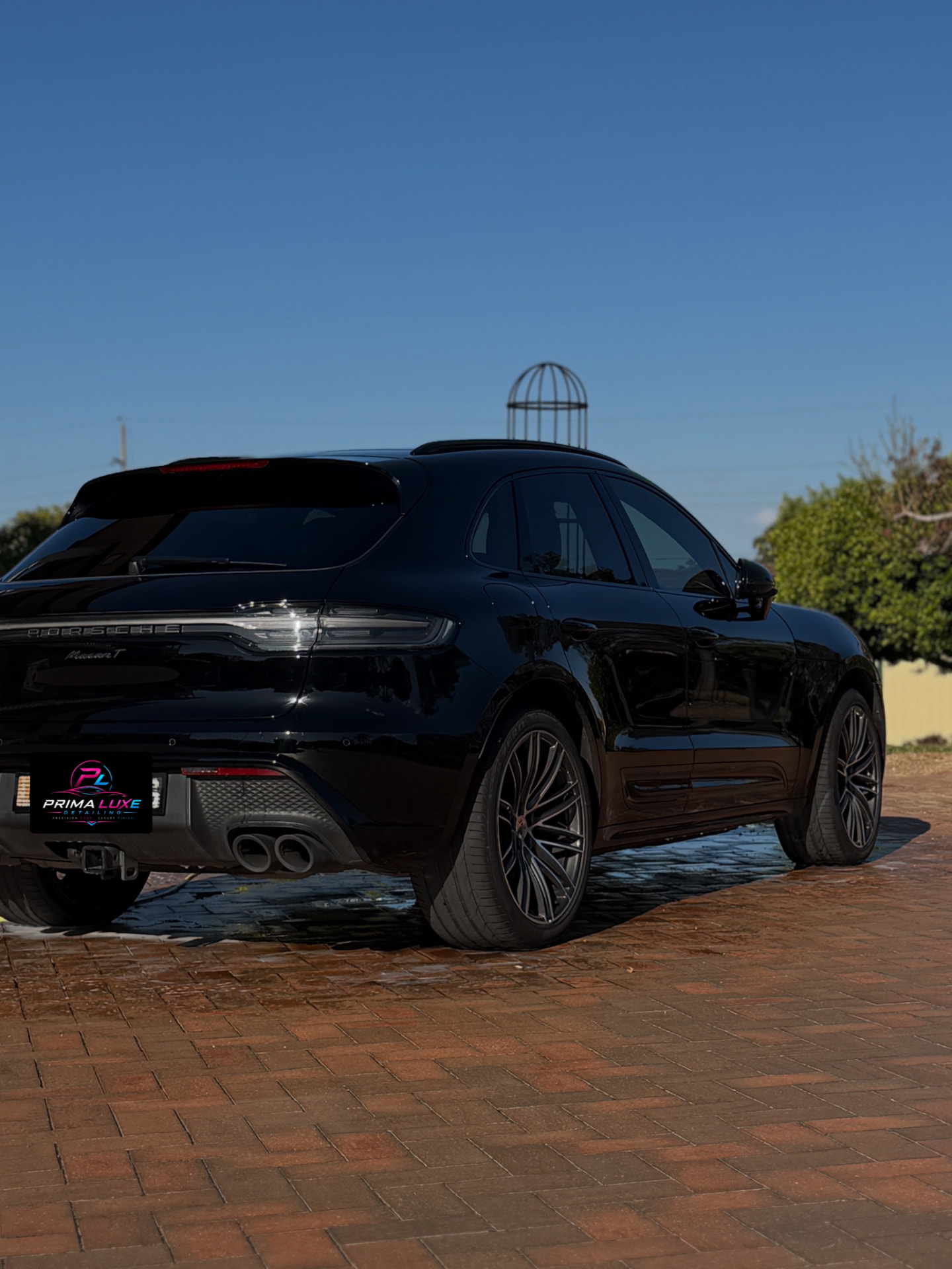 Porsche Macan with a glossy, spotless finish after detailing